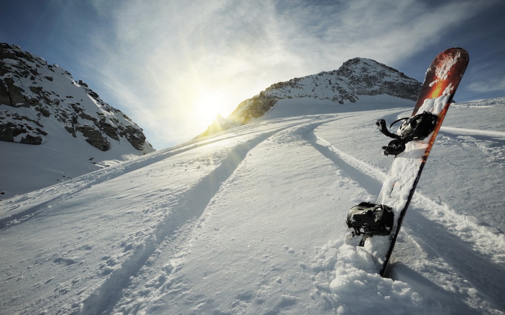 Snowboard in mountains
